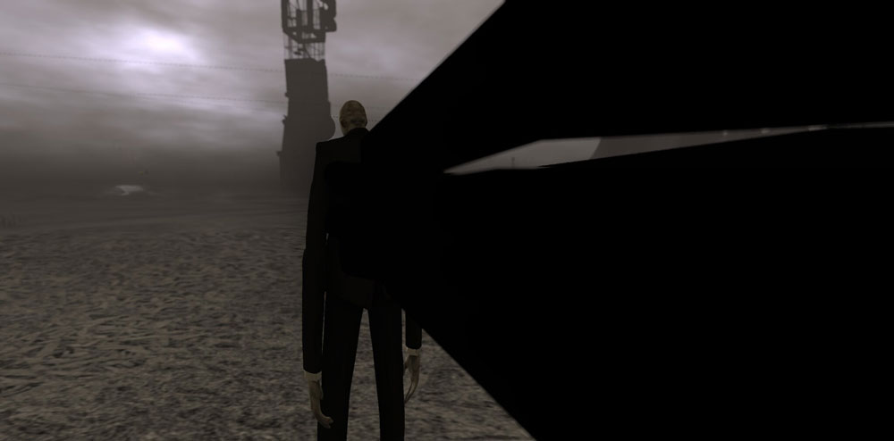 Skugglik figur med mörk kostym och långa armar. 