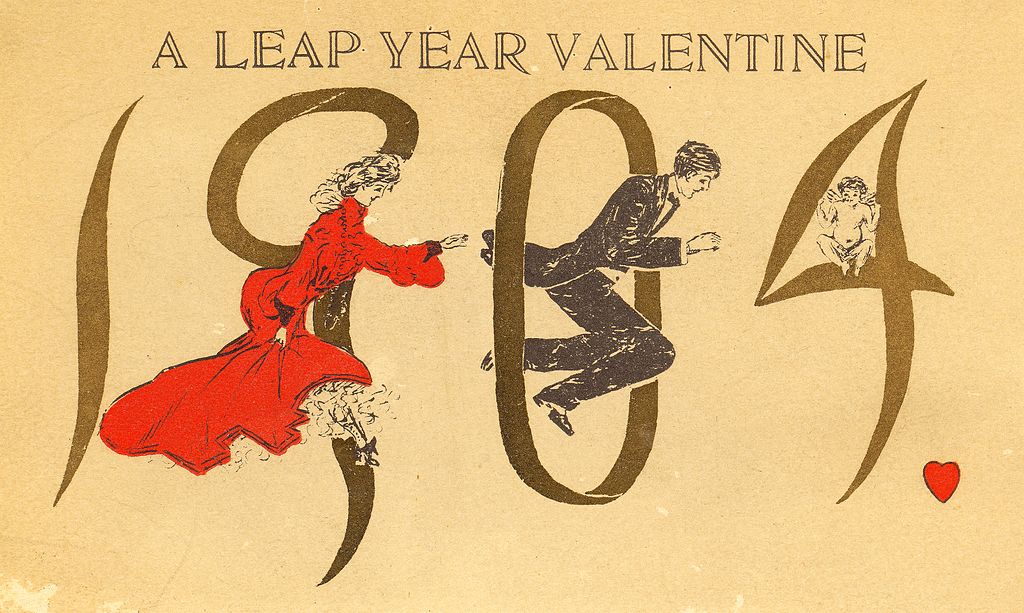 gulnat vykort med texten "a leap year valentine". På bilden syns siffrorna 1904 och även en kvinna i röd långklänning som jagar en frackklädd man.